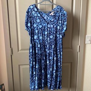 V Neck front and back, midi length, short sleeve dress.  Flowy and never worn!